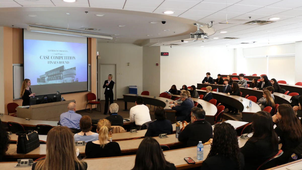 WLU auditorium with students presenting in LCFC